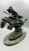 A Bronze on a marble base of an American Indian on horseback.