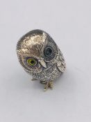 A Silver Owl Figure with glass eyes