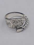 A solid silver spoon ring made from Antique cutlery by an Artisan. Successful bidders can notify