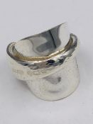 A solid silver spoon ring made from Antique cutlery by an Artisan. Successful bidders can notify