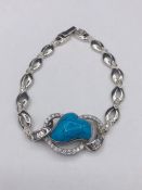 A silver CZ and Turquoise bracelet