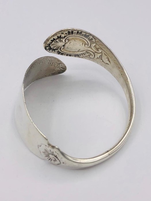 A Hallmarked silver bangle, made by Artisan from silver cutlery.. - Image 3 of 3