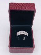 An Impressive 14ct white gold half eternity ring of 1ct approx.