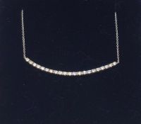 An 18ct white gold diamond bar necklace