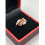 A 9ct gold Topaz and Diamond ring