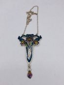 A silver and enamel Art Nouveau style pendant necklace