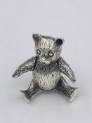 A silver articulated Bear brooch