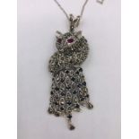 A Silver and Marcasite Fox Form necklace with ruby eyes