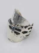 A solid silver spoon ring made from Antique cutlery by an Artisan. Successful bidders can notify