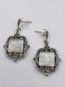 A Pair of Silver CZ and Opal Paneled drop earrings