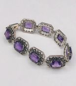 A silver Marcasite and Amethyst bracelet
