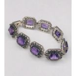 A silver Marcasite and Amethyst bracelet