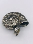 A silver plated vesta case in the form of a snail shell