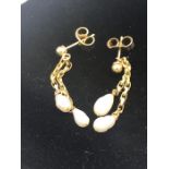 A set of pearl drop earrings on 9ct gold