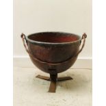 A Copper planter, cauldron on stand style.