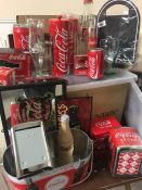 A Large collection of Coca-Cola promotional items and collectables.