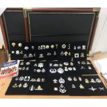 A Large selection of Military replica cap badges.