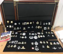 A Large selection of Military replica cap badges.