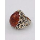 A silver and amber style large Cabochon ring