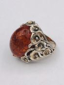 A silver and amber style large Cabochon ring