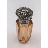 A silver glass perfume bottle with Vinaigrette style lid