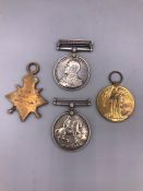 A WWI Trio of medals and a Naval General Service Medal 1909-1914 clasp. M6871 W.Kean ARM.CR.HMS