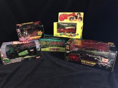 A selection of five diecast vehicles to include Monkeymania and Scooby Doo.