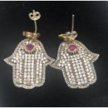 A set of silver earrings