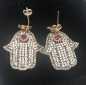 A set of silver earrings