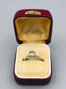 An 18ct white gold single stone diamond ring of 1ct