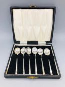 A cased set of six silver coffee spoons