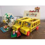 A Fisher Price 1970's school house with assorted items and a Fairground ride and school buses.