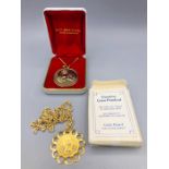 Two presentation gold plated coins