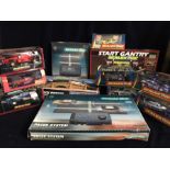 A selection of Scalextric cars along with Pacer system, Gantrys, Bridges, F1 Cars etc