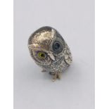 A Silver Owl Figure with glass eyes