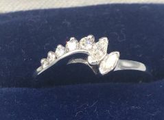 A Diamond ring in a 14ct white gold setting.