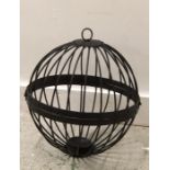 A Cast iron hanging candle cage