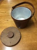 A Gentleman's Ice Bucket in leather case.