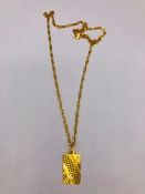 An Asian Gold 'Aquarius symbol and chain (7.7g)