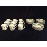 Portuguese china coffee cans, saucers and plates with vine design