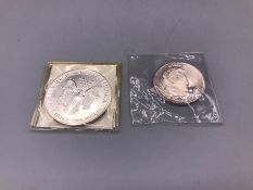 Two silver proof coins