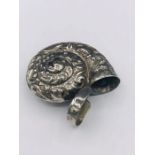 A silver plated vesta case in the form of a snail shell