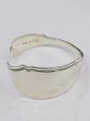 A silver bangle, artisan made with solid silver cutlery