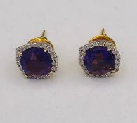 A Pair of 18ct yellow gold impressive Amethyst and Diamond Earrings of 4.2CT's