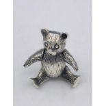 A silver articulated Bear brooch