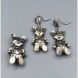 A set of Teddy Bear earrings and brooch