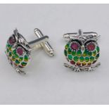 A Pair of Silver and Plique A Jour cufflinks