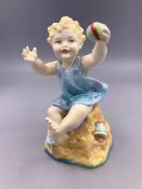 Royal Worcester figure of a Child On The Beach