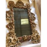 A Stripped Lime and Pine Mirror. A modern rectangular plate within an elaborate pierced foliate