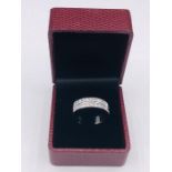An Impressive 14ct white gold half eternity ring of 1ct approx.